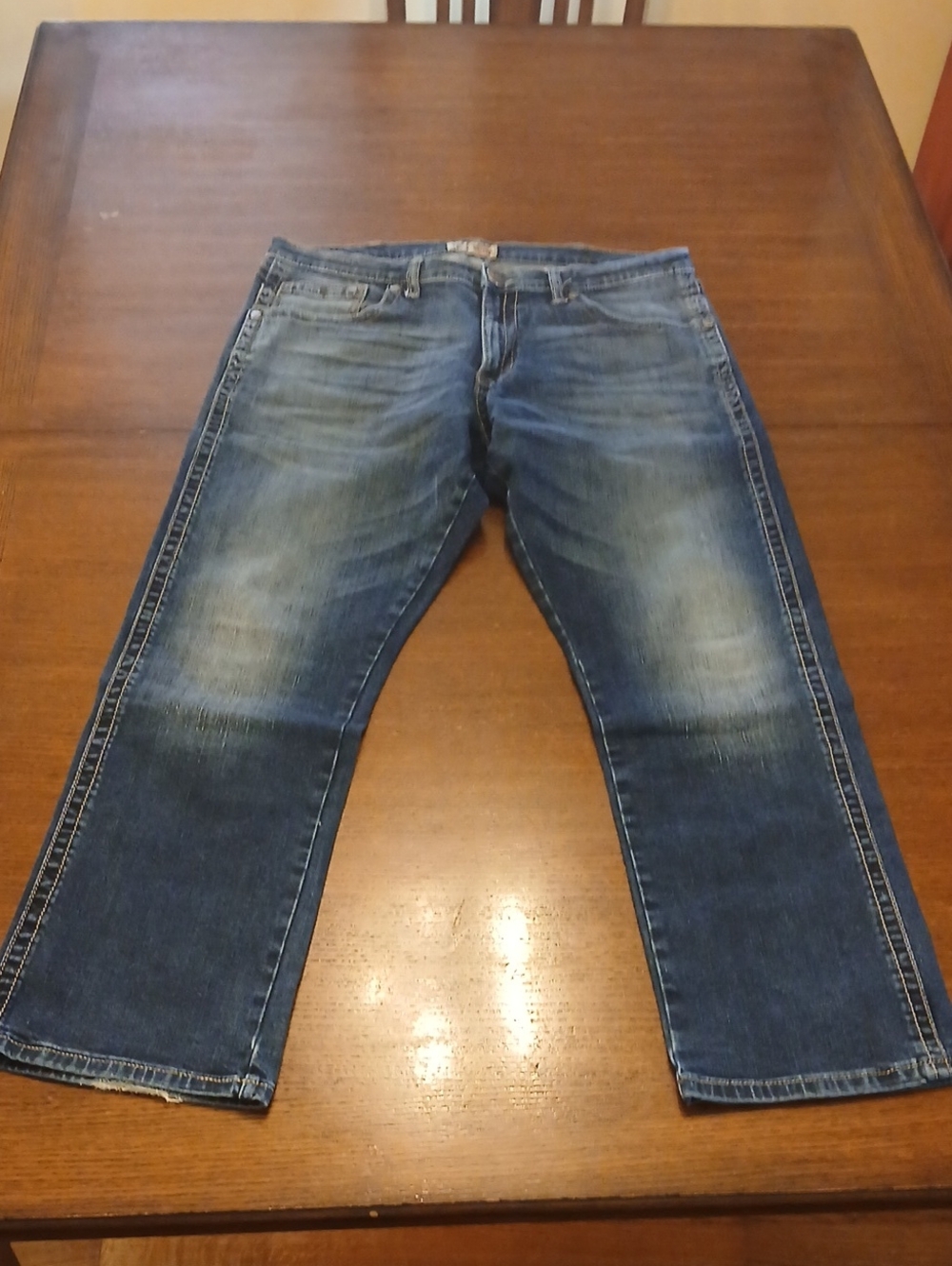 Wrangler Men's Faded Blue Relaxed Fit Jeans